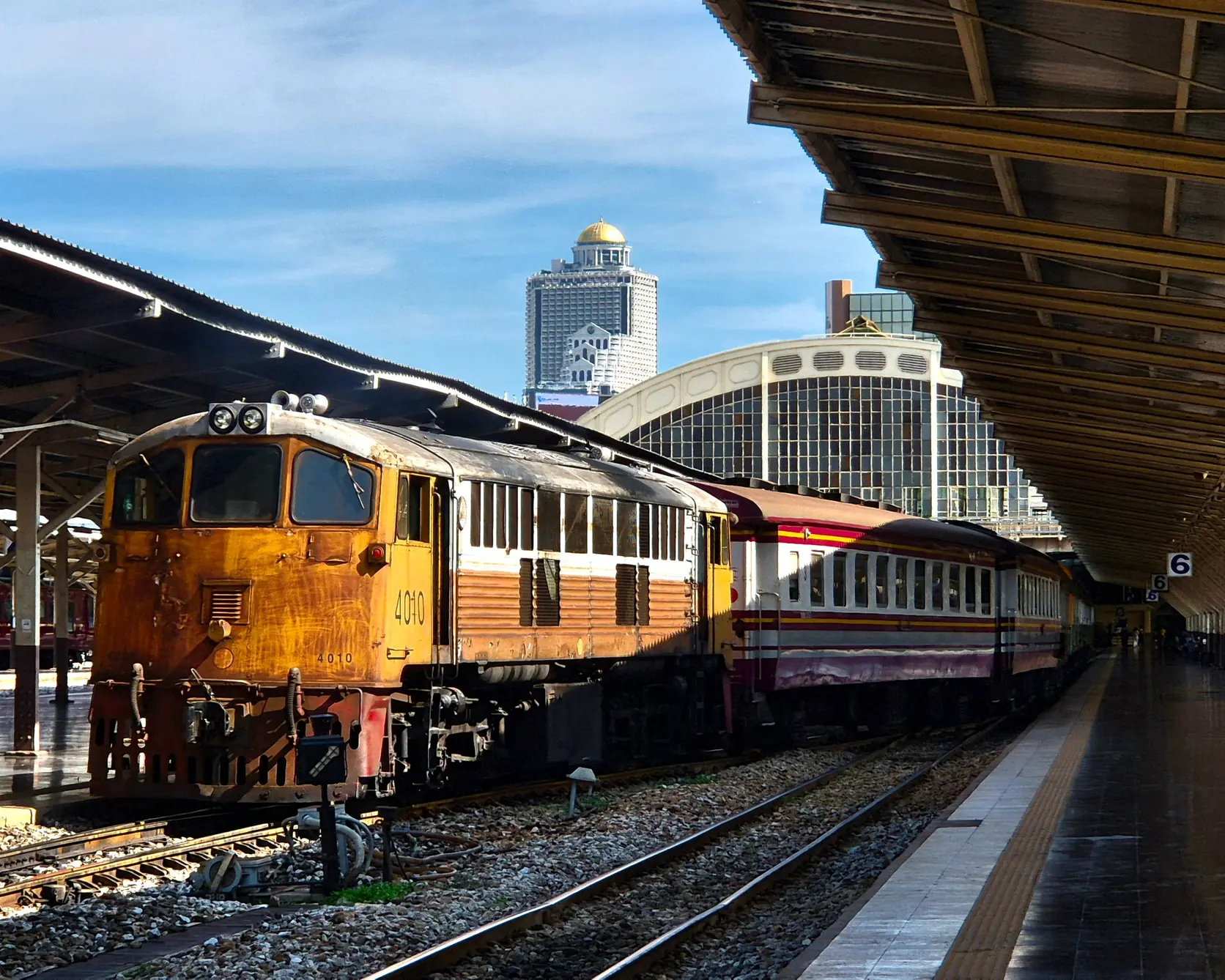 A diesel train at the platform of Hua Lamphong station in Bangkok